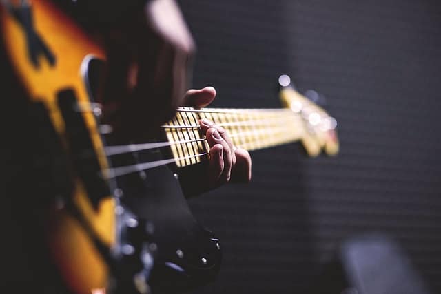 Man playing his guitar